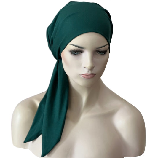 Cotton jersey chemo caps with attached short ties at Hat Show.