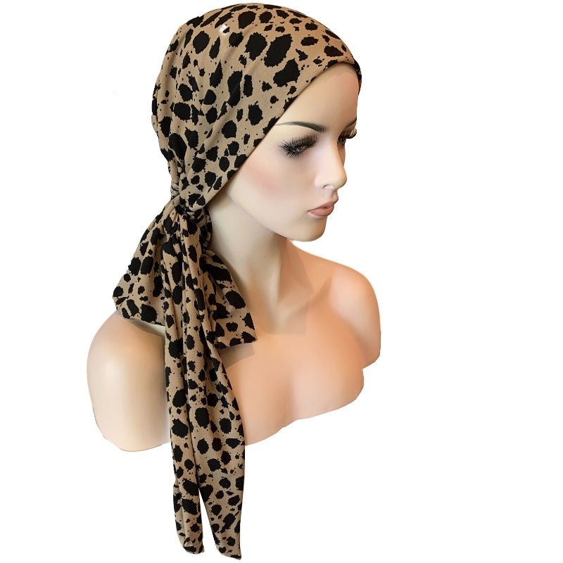 Cap with Attached Long Ties at Hat Show