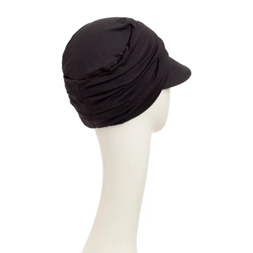 CHRISTINE SOLANA SUN CAP IN BLACK AT HAT SHOW
